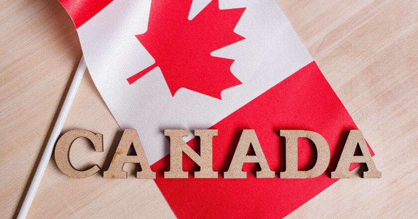 Flag of Canada, the word Canada in wooden abstract letters